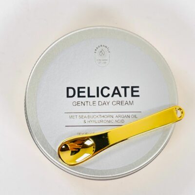 Delicate day cream with mini spoon